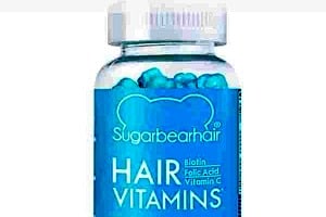 Pinterest graphic of a bottle of sugar bear hair with text overlay "do sugar bear hair vitamins work?"