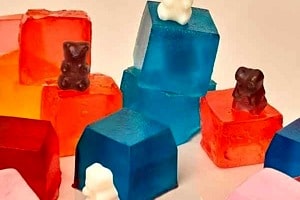 Pinterest graphic of gummy bears with the text overlay "sugar bear hair, does it work?"