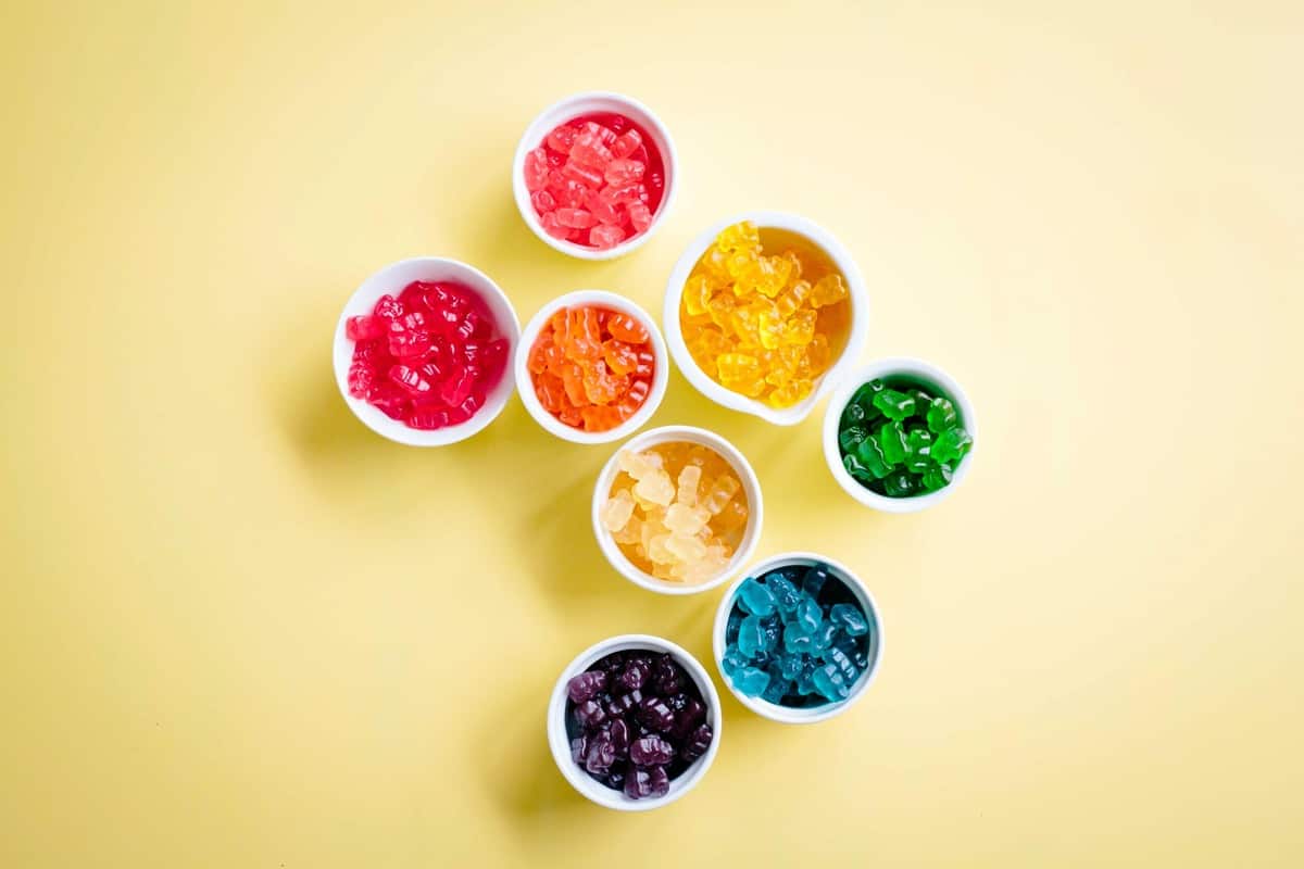 Birds eye view of several portioned sugar bear hair gummies. 