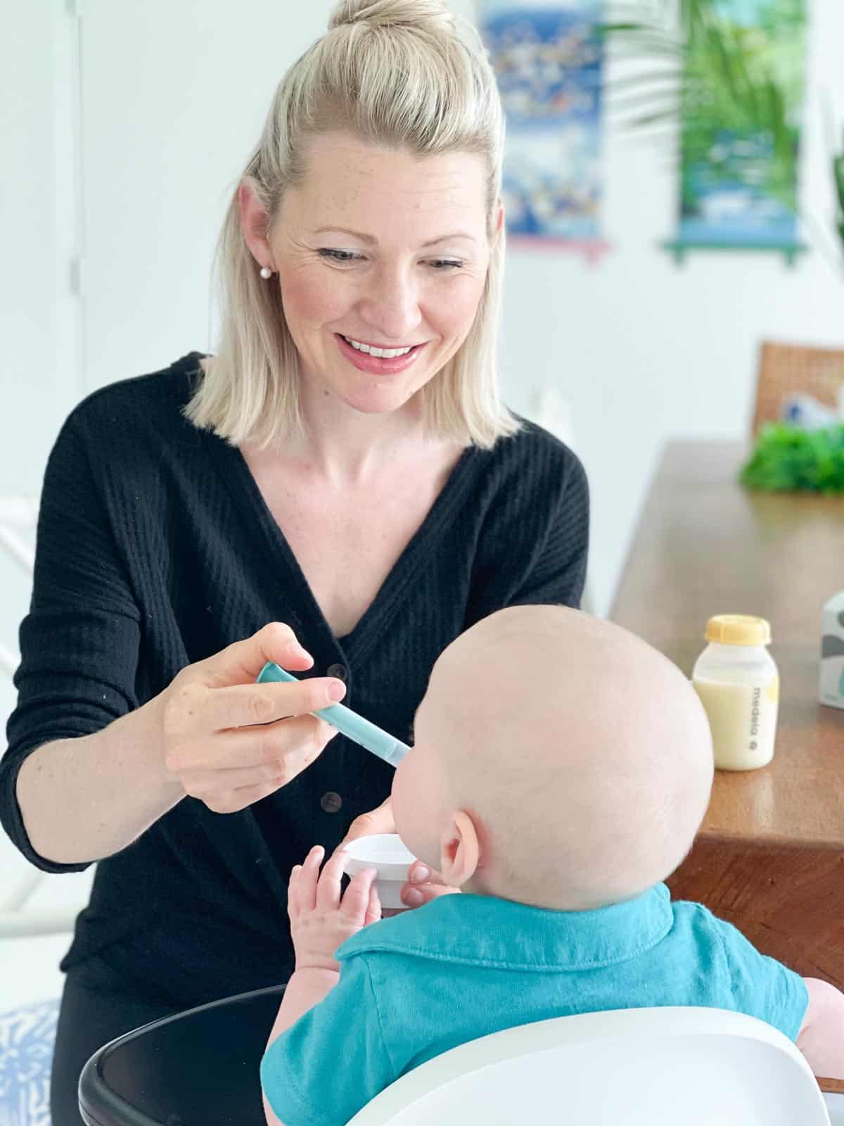 Abbey giving Baby O probiotics to support baby's immune system. 