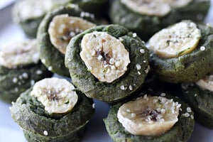 Pinterest graphic of a plate of spinach muffins.