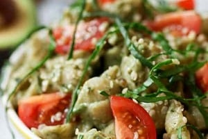 Pinterest graphic of a bowl of avocado pasta with the text overlay "avocado pasta."