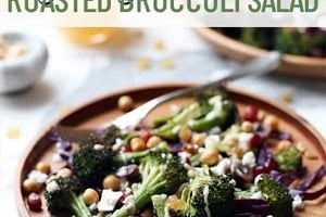 Pinterest graphic of a plate of roasted broccoli salad on a wooden plate with text overlay "vegan, gluten-free roasted broccoli salad."