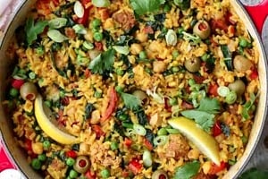 Pinterest graphic of a Dutch oven with vegan paella.