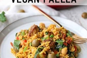 Pinterest graphic of a plate of paella with the text overlay "healthy protein-packed vegan paella."