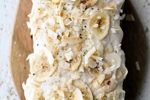 Pinterest graphic of the overhead view of a banana carrot cake.