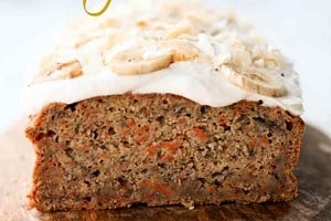 Pinterest graphic of a cake with the text overlay "banana and carrot vegan cake."