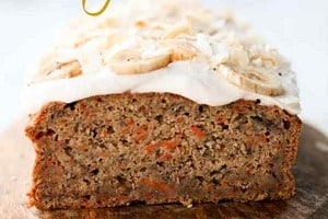 Pinterest graphic of a cake with the text overlay "banana and carrot vegan cake."