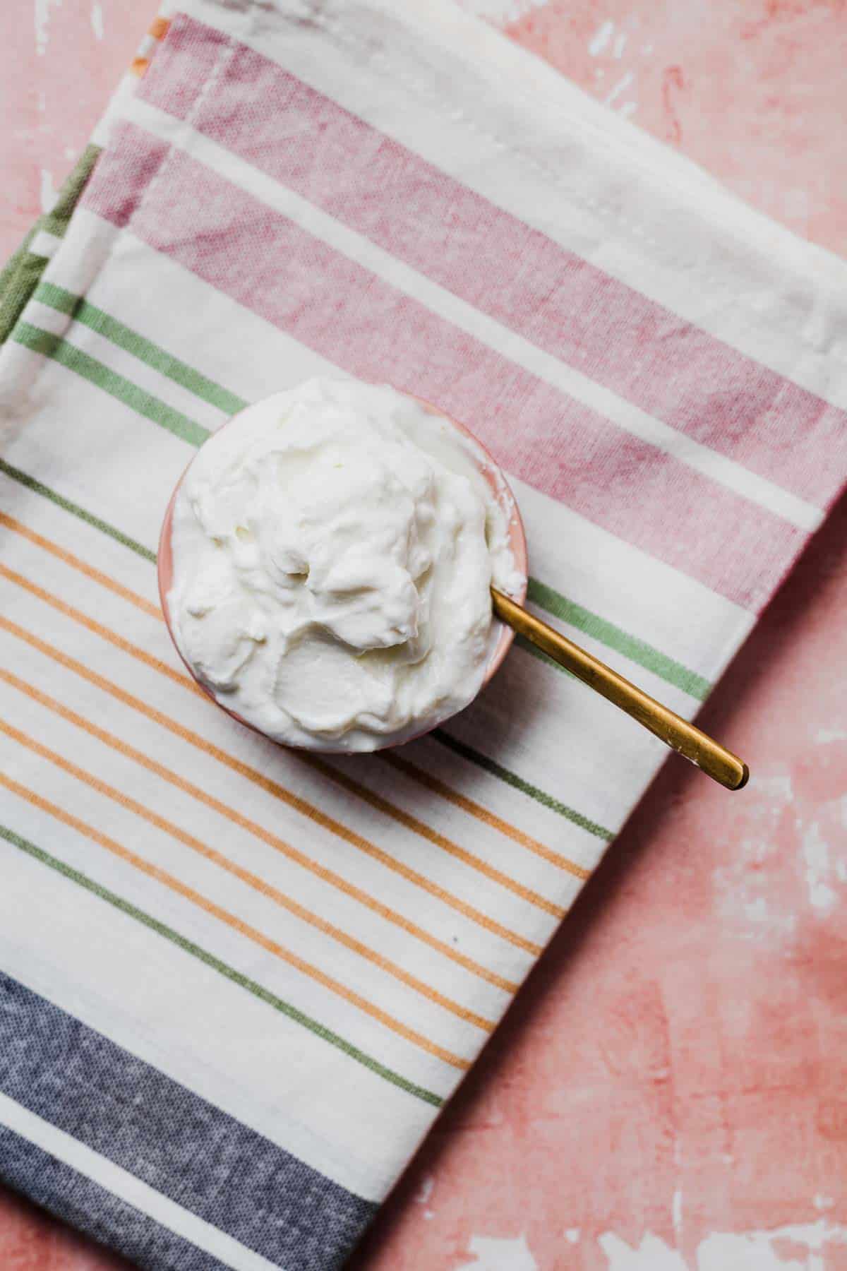 Close up of a bowl of Greek yogurt.