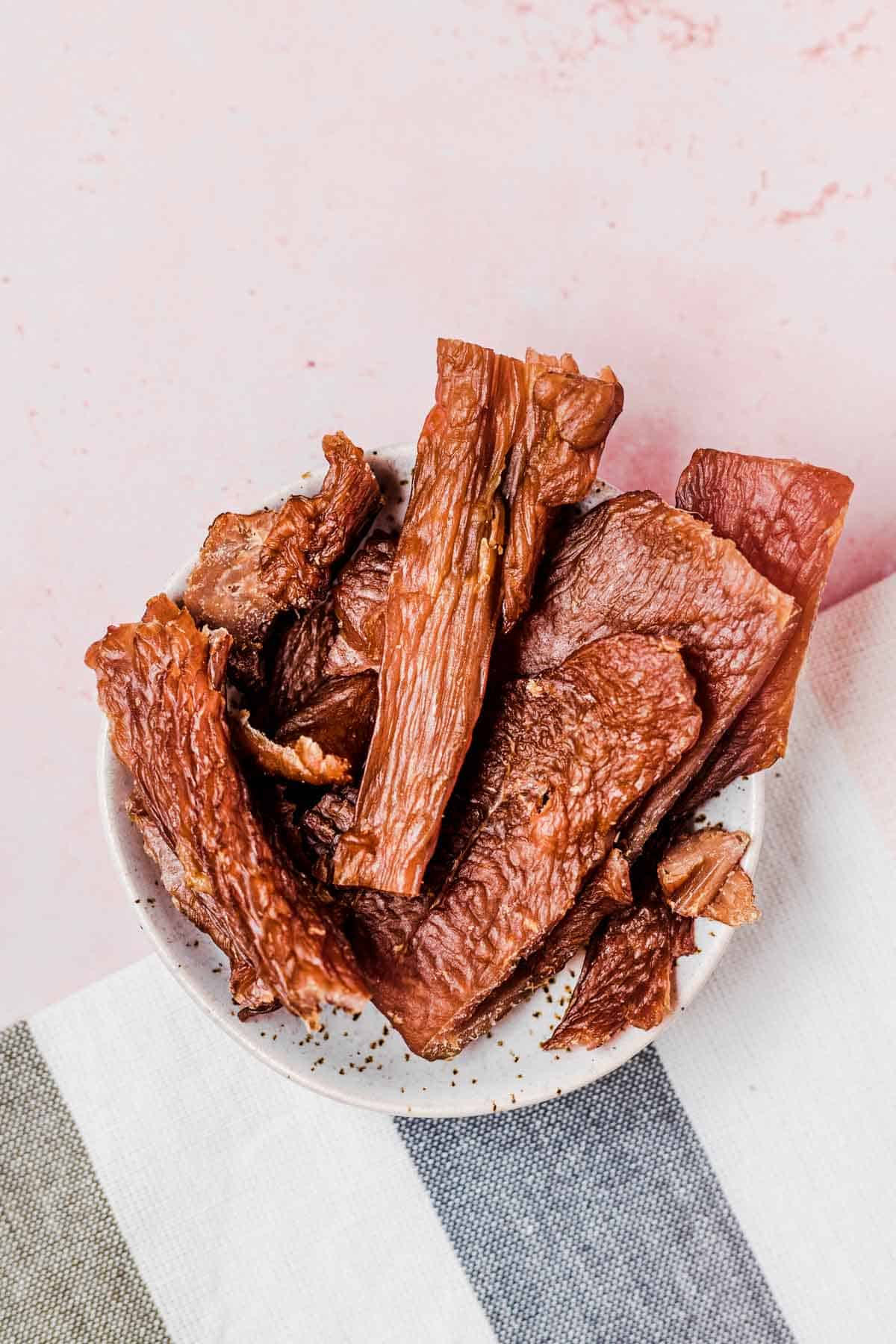 Birds eye view of jerky in a bowl.