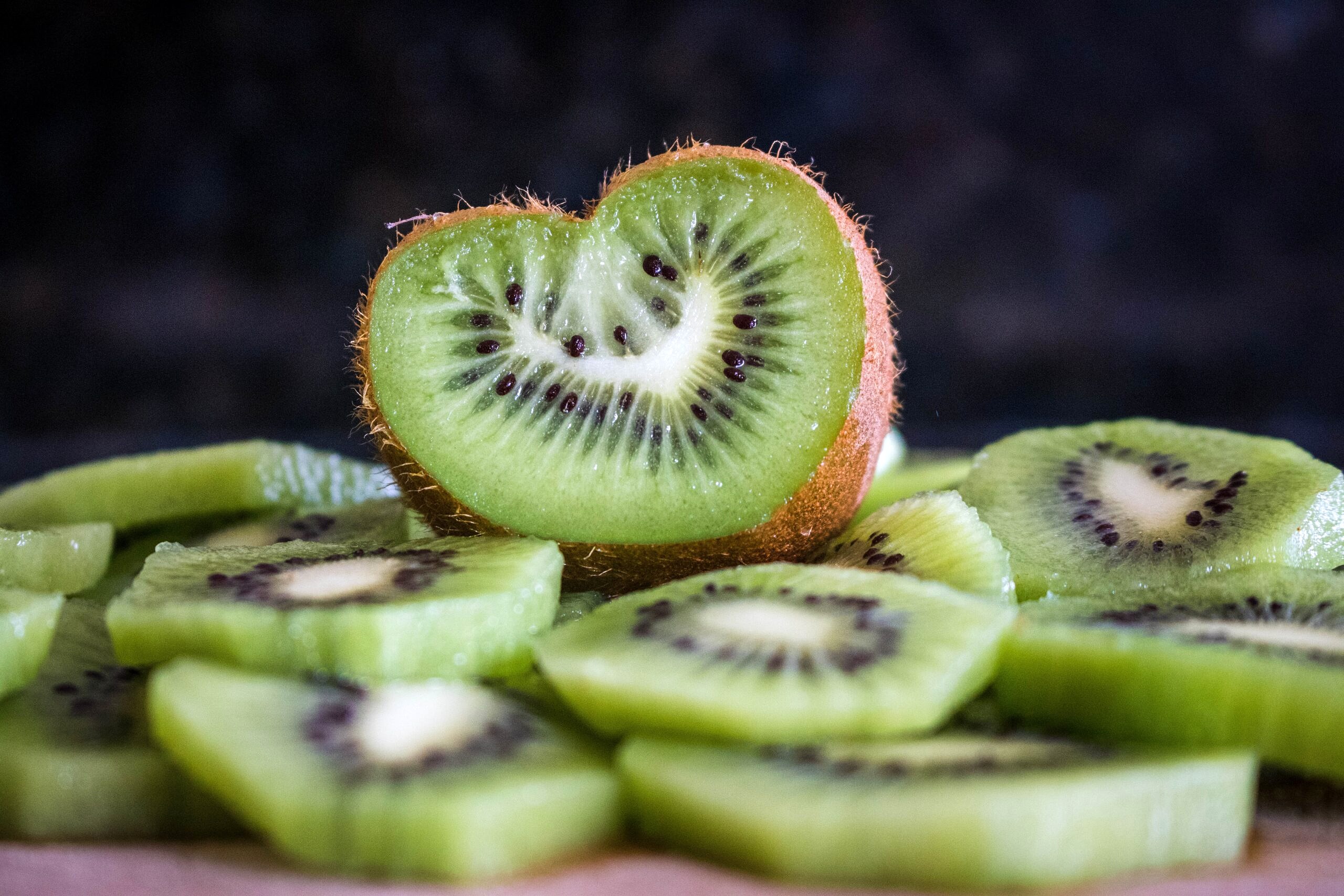 Close up of kiwis on a plate.