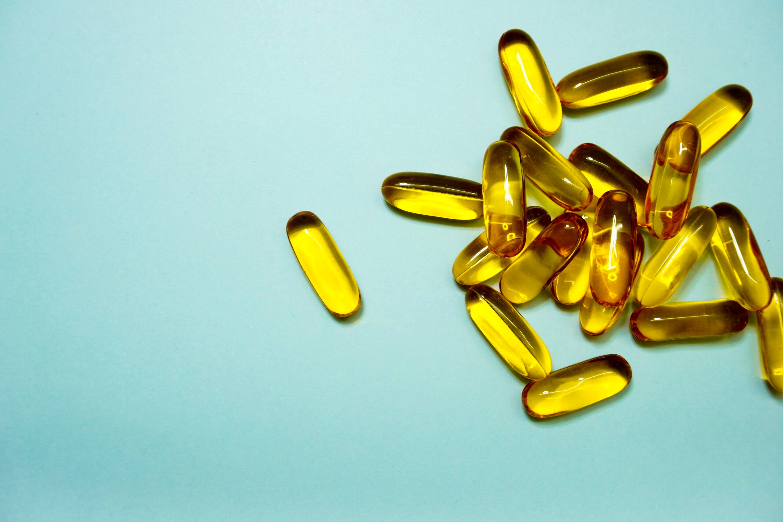 Yellow supplements against a blue background.