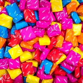 Close up of candy in colourful wrapping.