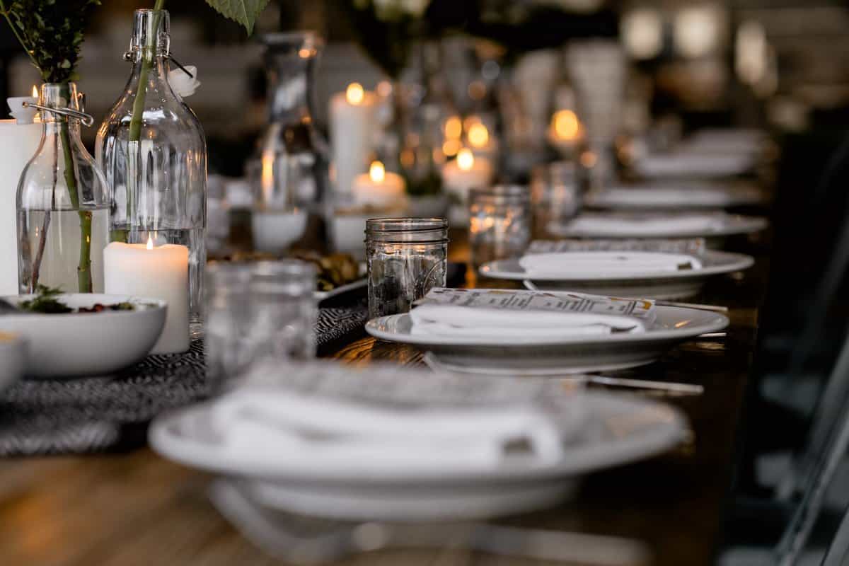 Table set with places for a dinner party.