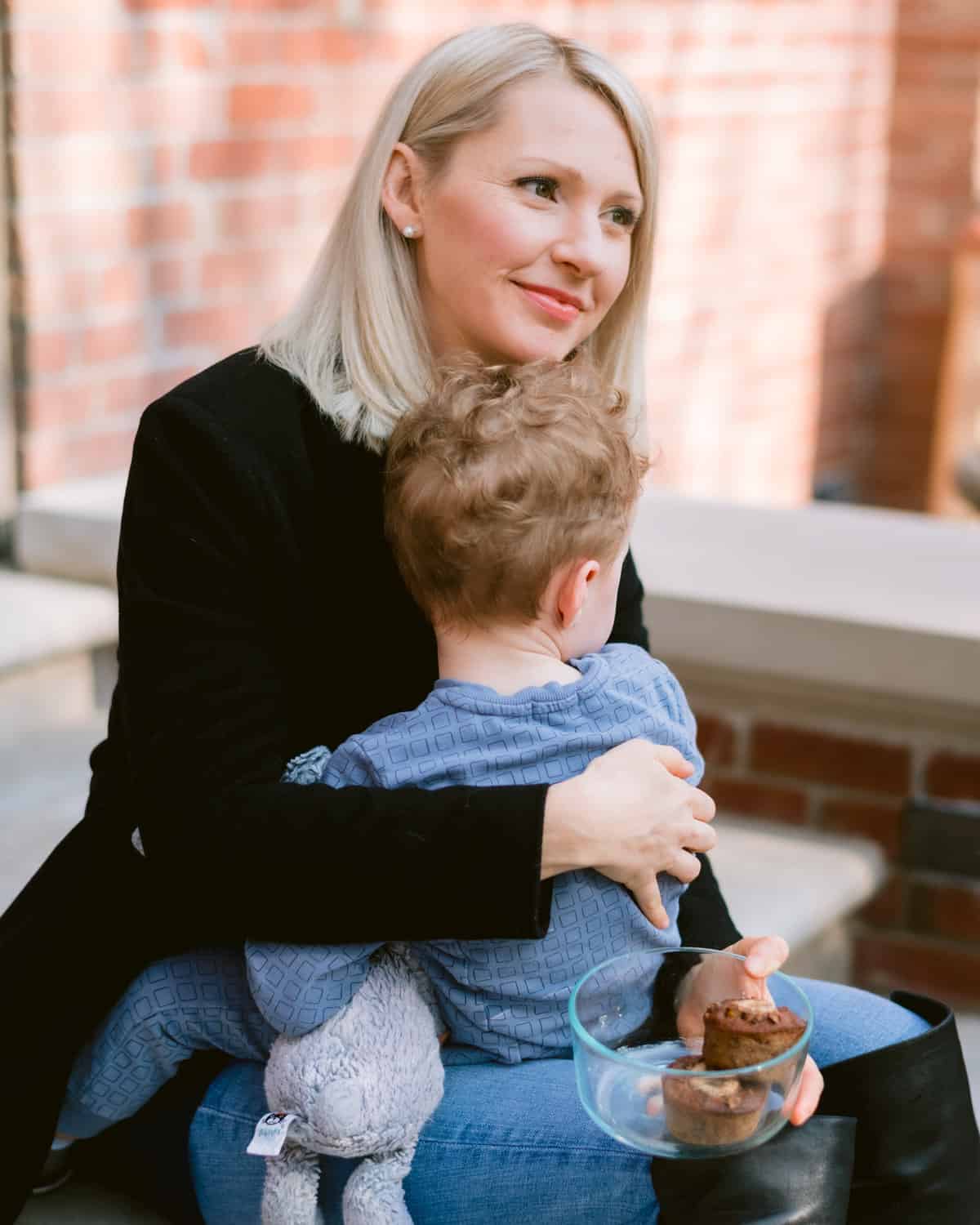 Abbey hugging her son.