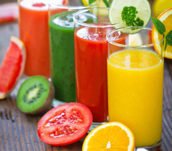 Multiple glasses of juices.