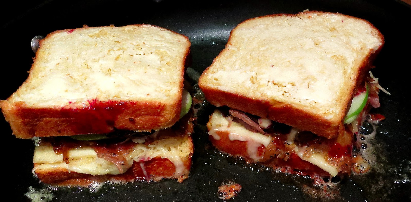 A close up of a sandwich in a pan.