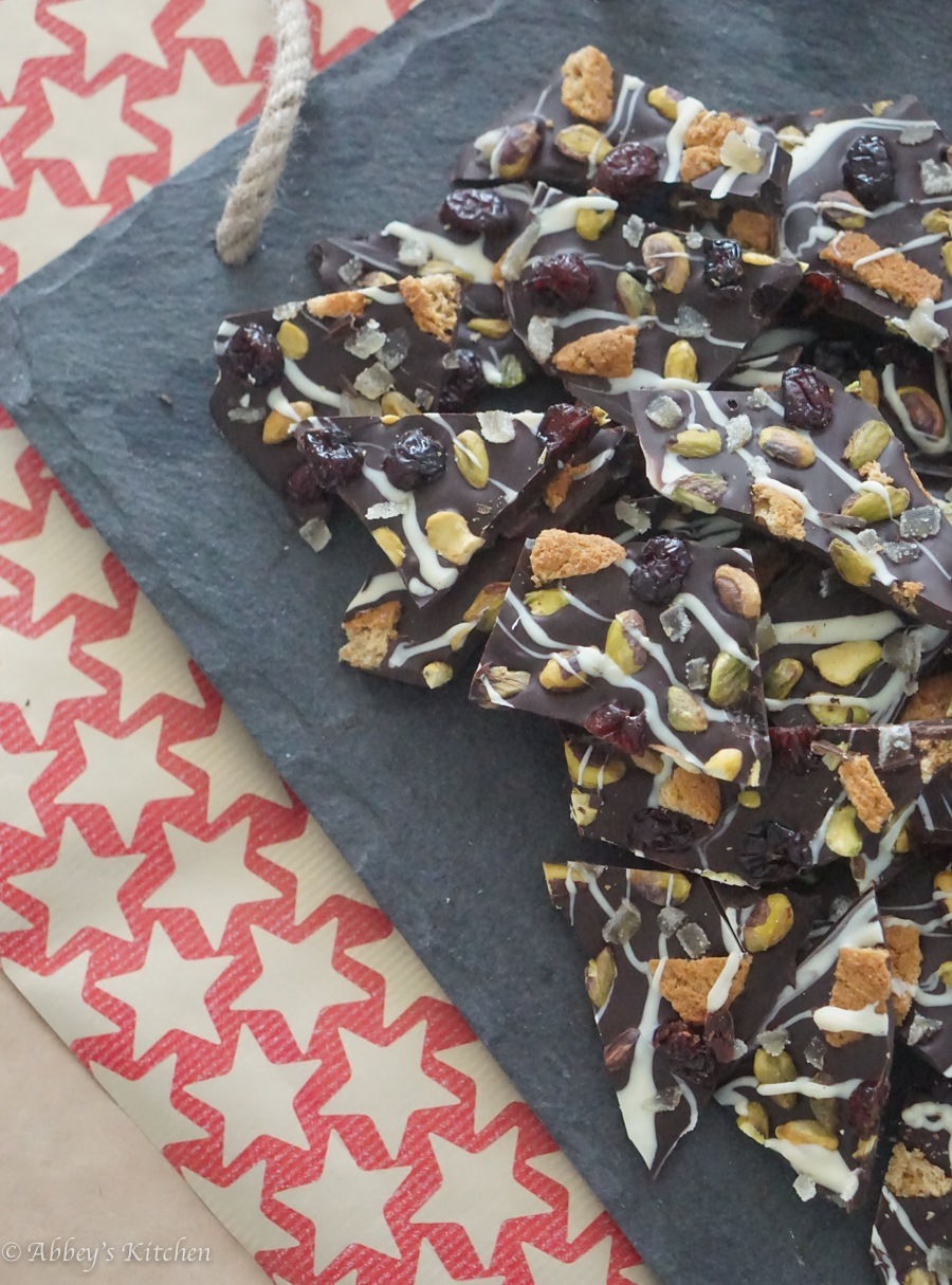 A serving of chocolate bark with cranberries and pistachios. 