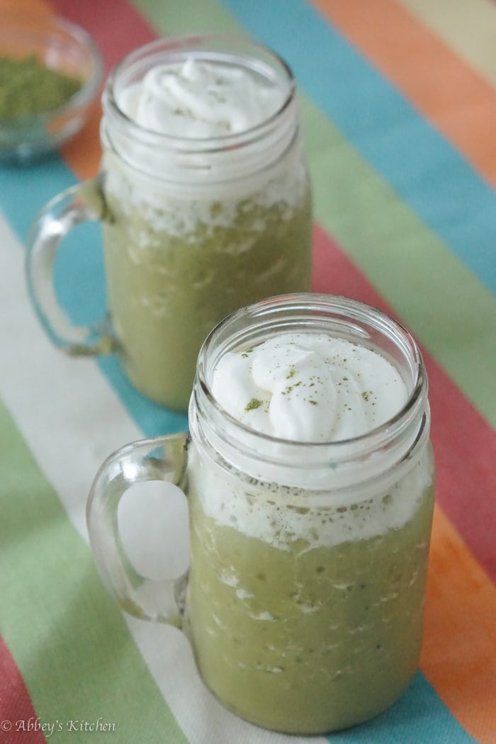 two homemade green tea frappucinos in tall glasses