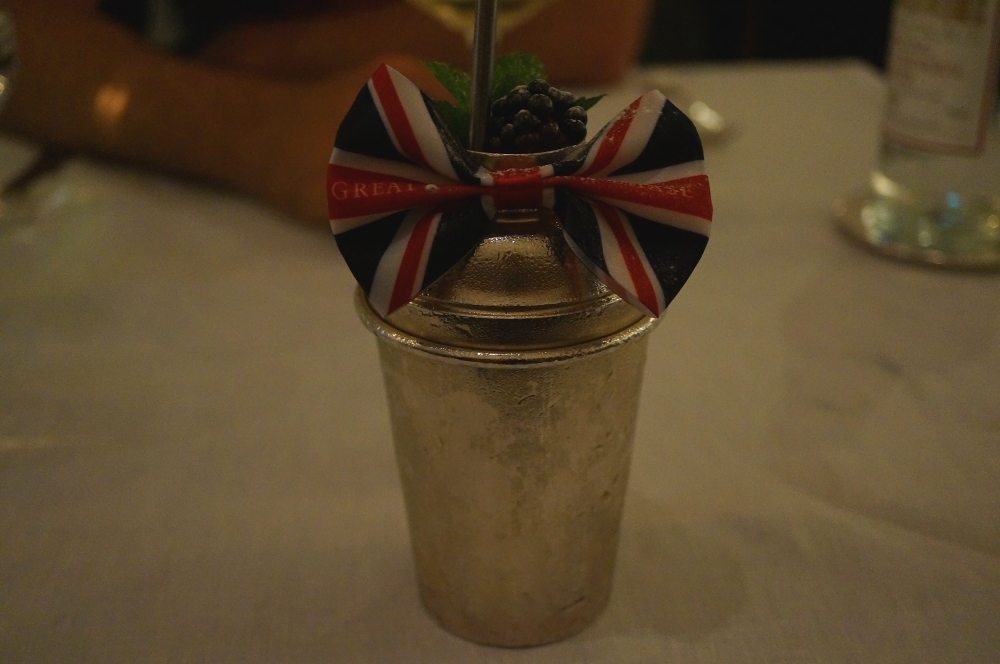 A cocktail shaker with a UK flag printed bow tie.